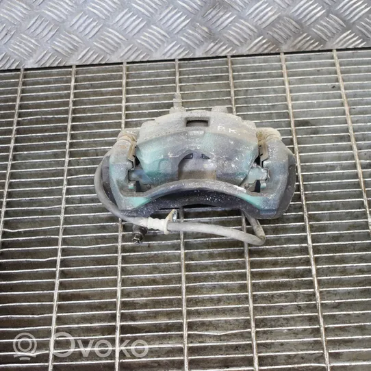 Mitsubishi L200 Caliper de freno delantero 