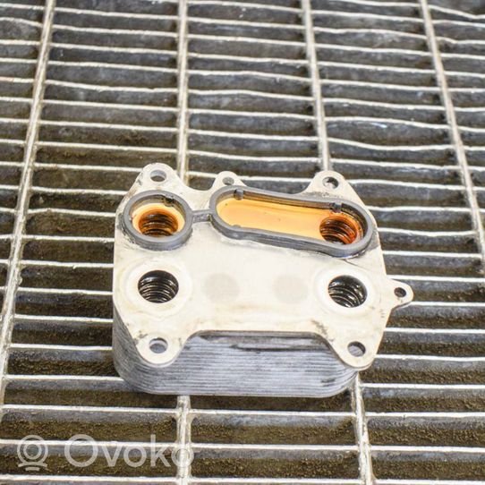 Volkswagen PASSAT B7 Engine oil radiator 03L117021C