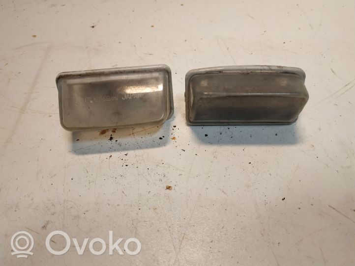 Toyota Previa (XR30, XR40) II Lampa oświetlenia tylnej tablicy rejestracyjnej 