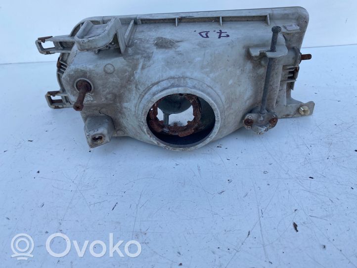 Toyota Corolla E90 Lampa przednia 2121140