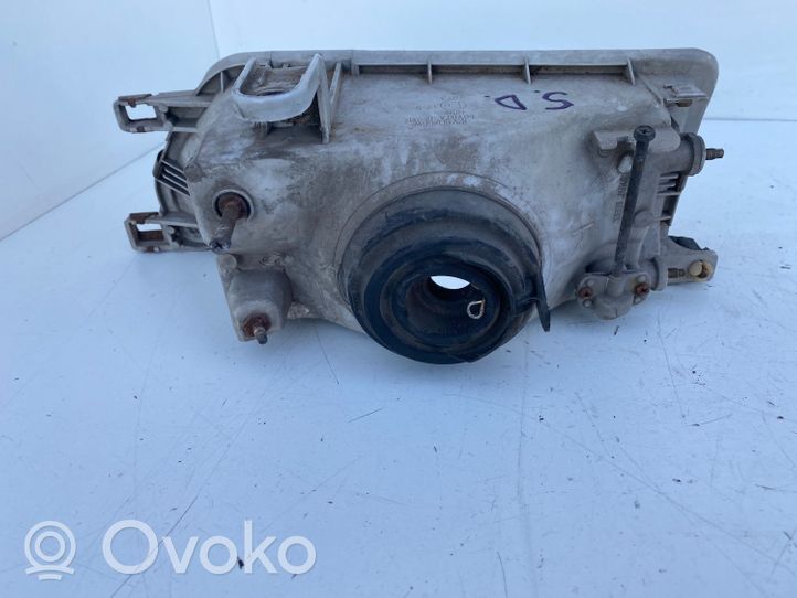 Toyota Corolla E90 Lampa przednia 12307