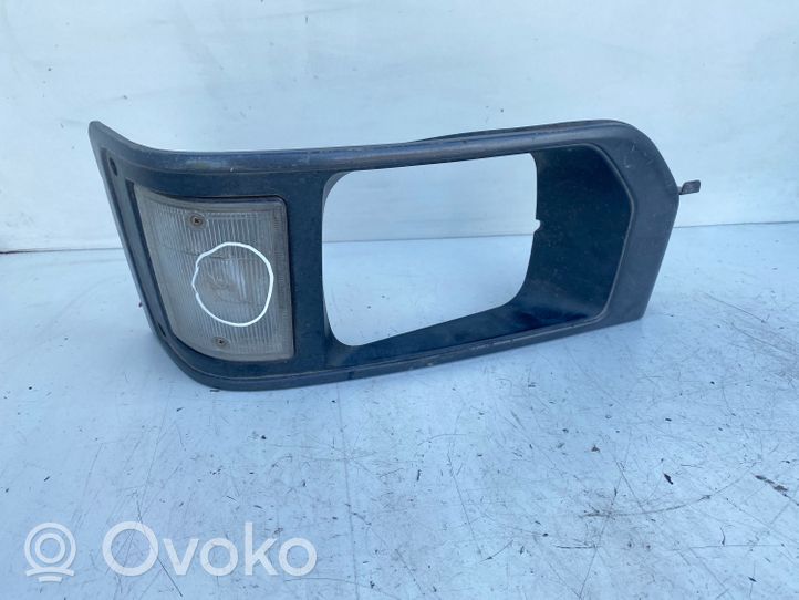 Isuzu Midi Rivestimento sotto il faro/fanale 21221394