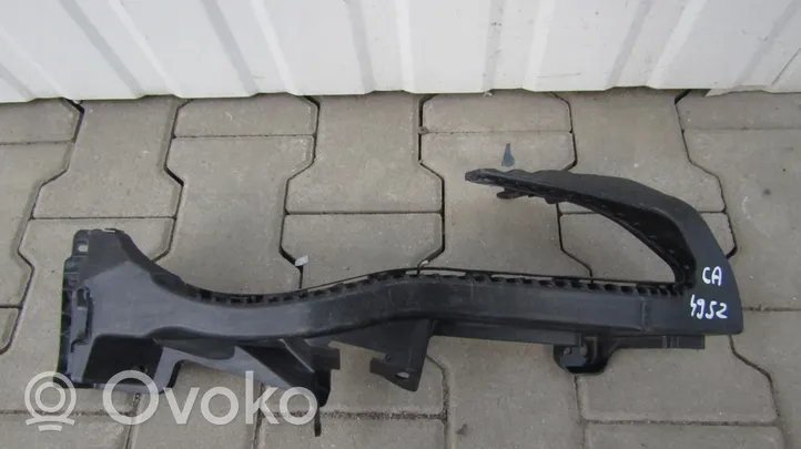 Subaru Legacy Uchwyt / Mocowanie lampy przedniej 57707CA002