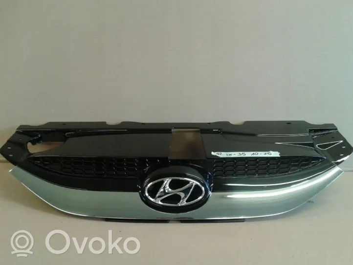 Hyundai ix35 Grille calandre supérieure de pare-chocs avant 