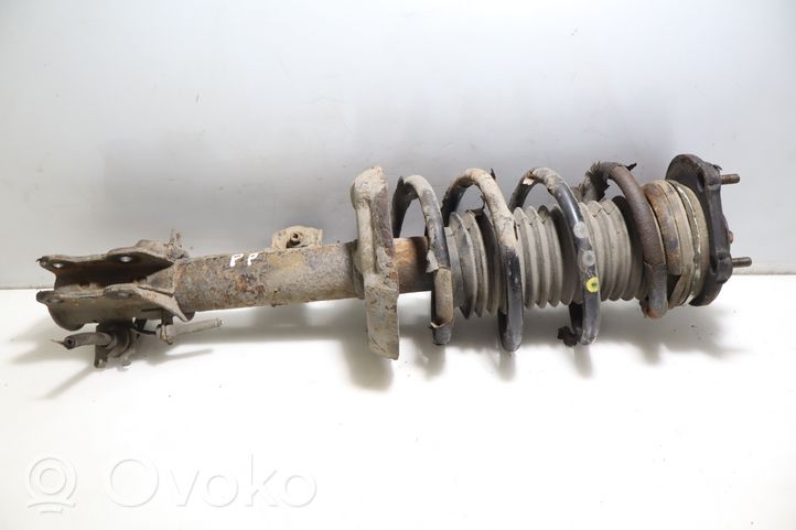 Opel Combo D Front shock absorber with coil spring 