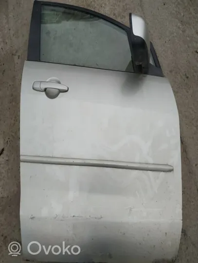 Mazda 5 Drzwi przednie pilkos