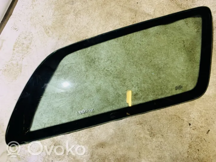 Ford Mondeo MK II Aizmugurējais virsbūves sānu stikls 