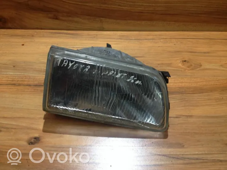 Toyota Starlet (P80) IV Lampa przednia 