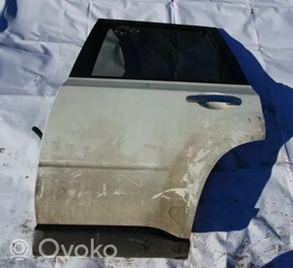 Nissan X-Trail T31 Rear door baltos