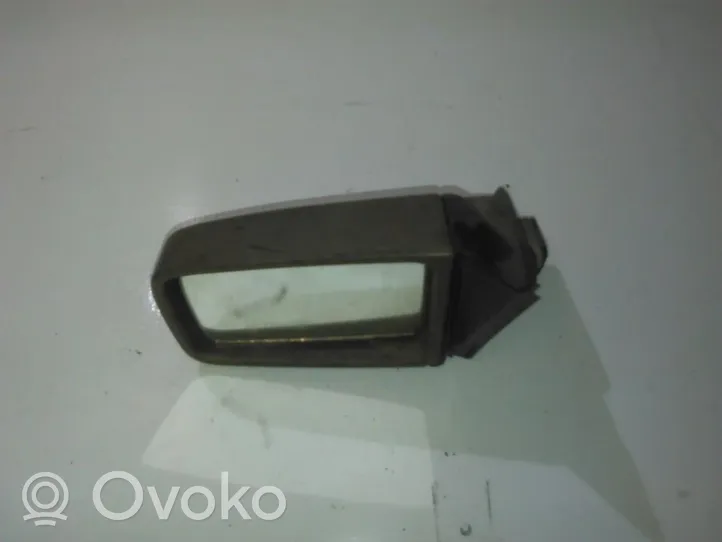 Opel Kadett E Front door electric wing mirror 1671434