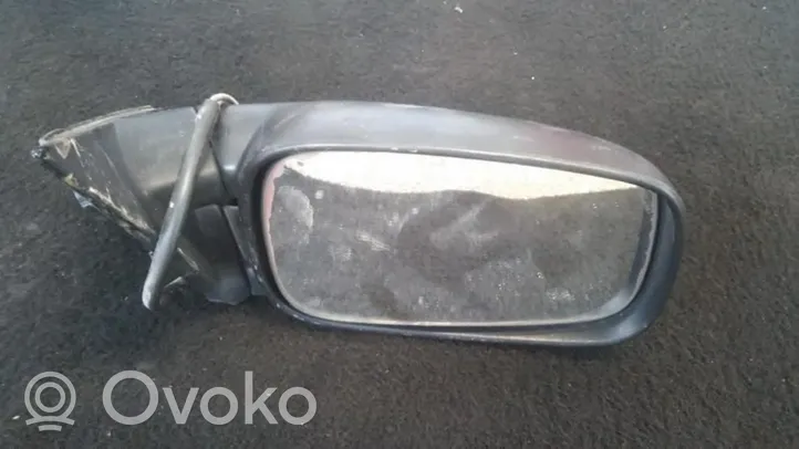 Volkswagen PASSAT B3 Front door electric wing mirror 0017273