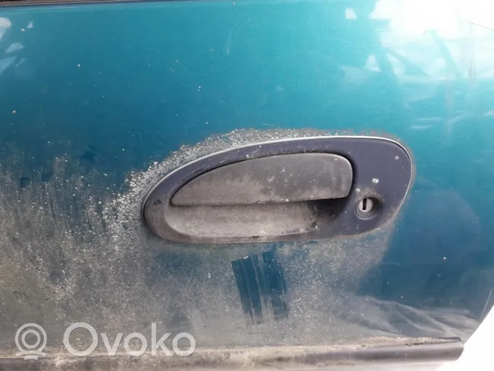 Mazda 323 F Klamka zewnętrzna drzwi 