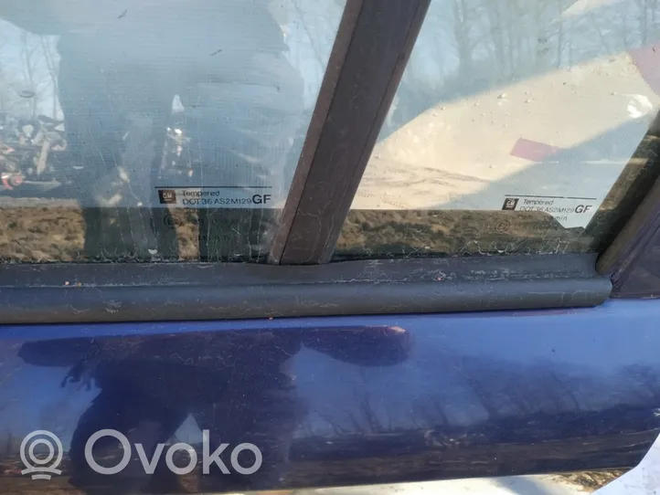 Opel Astra G Takaoven lasin muotolista 