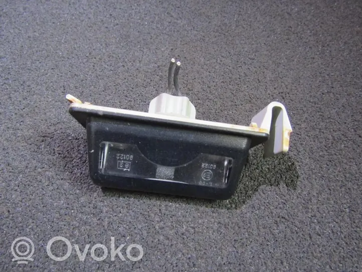 Mazda 323 Lampa oświetlenia tylnej tablicy rejestracyjnej 