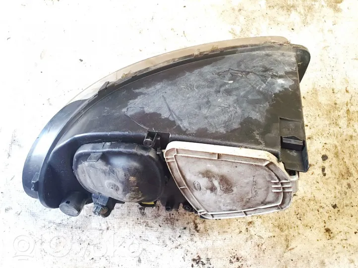 Dodge Caravan Lampa przednia 04857702ab