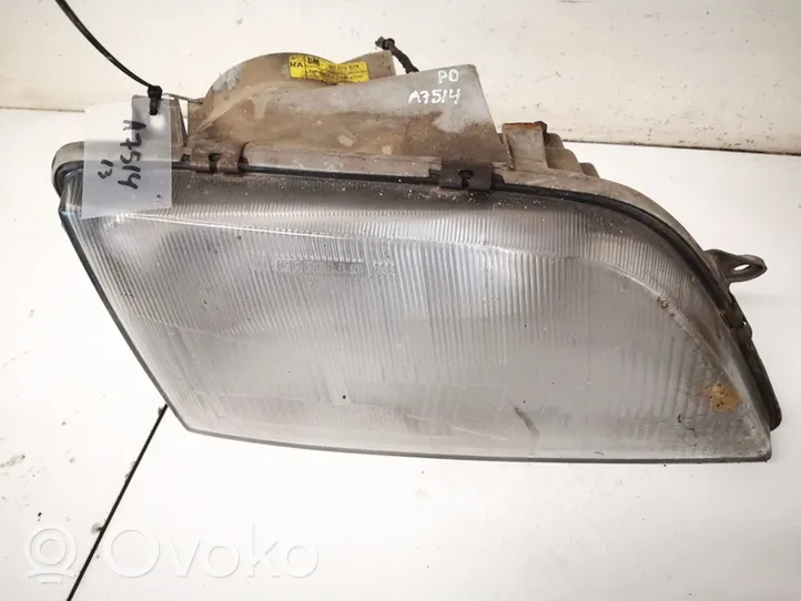 Opel Omega A Lampa przednia 90213578