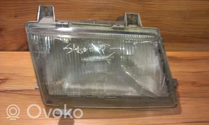 Saab 9000 CS Lampa przednia 301133864