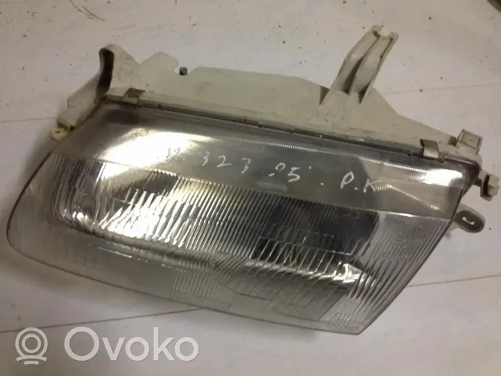 Mazda 323 Lampa przednia 082161126M