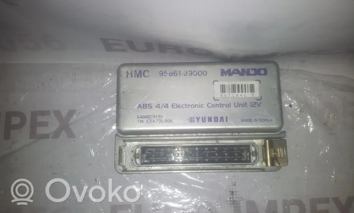 Hyundai Coupe ABS control unit/module 9566129000