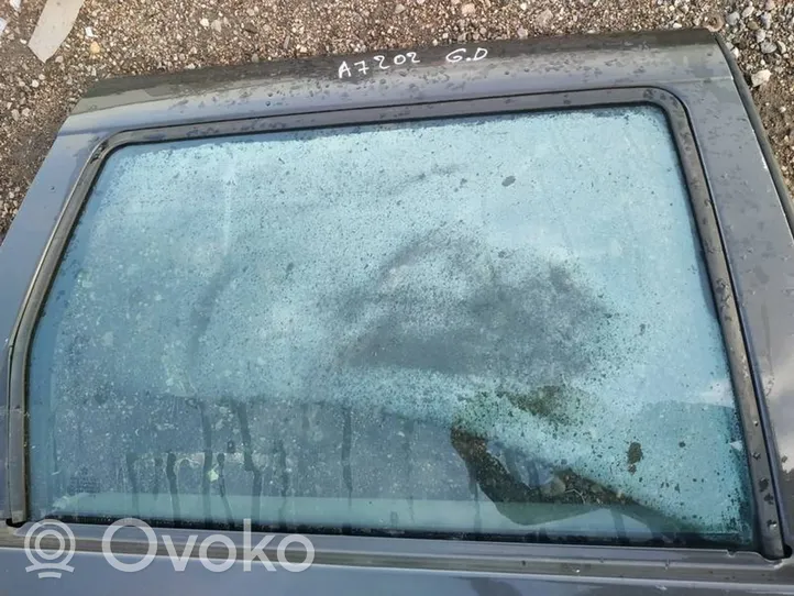 Jeep Grand Cherokee (WK) Takaoven ikkunalasi 