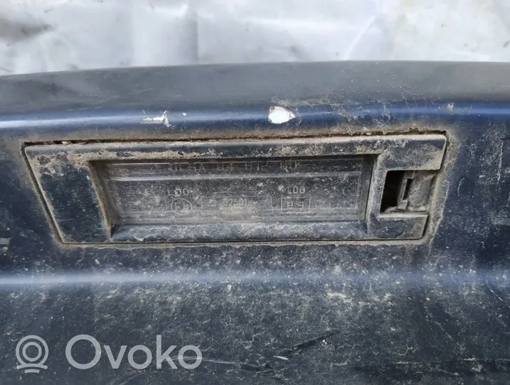 Opel Corsa C Lampa oświetlenia tylnej tablicy rejestracyjnej 