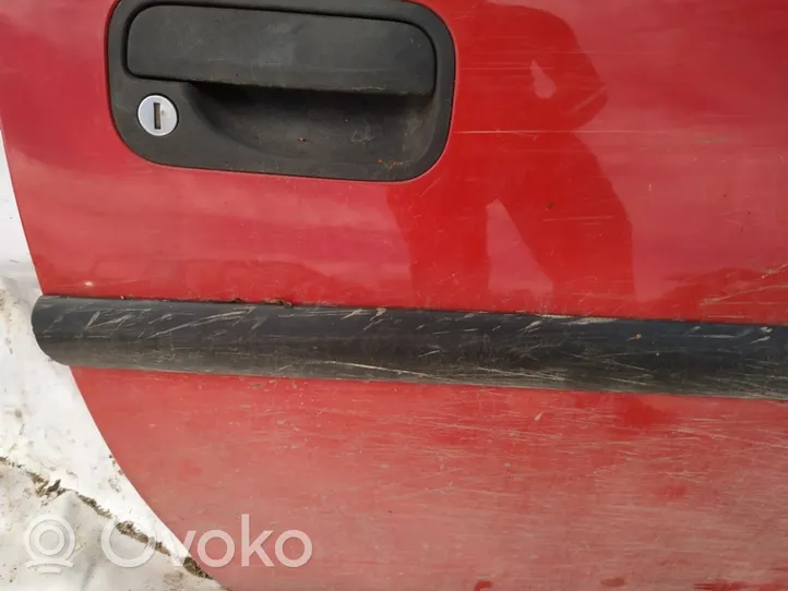 Opel Corsa B Front door trim (molding) 