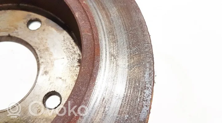 Nissan Almera N16 Tarcza hamulca tylnego neventiliuojamas