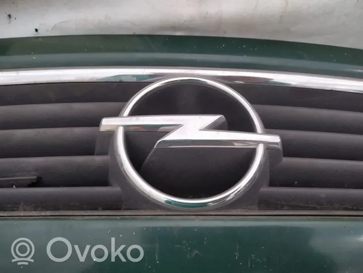 Opel Astra G Mostrina con logo/emblema della casa automobilistica 