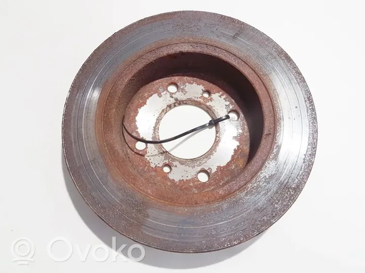 Nissan Almera N16 Rear brake disc neventiliuojamas