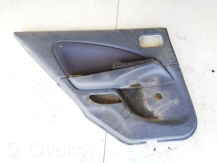 Nissan Almera N16 Rivestimento del pannello della portiera posteriore 82977bn100