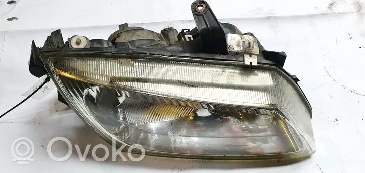 Nissan Almera N16 Lampa przednia 89003330