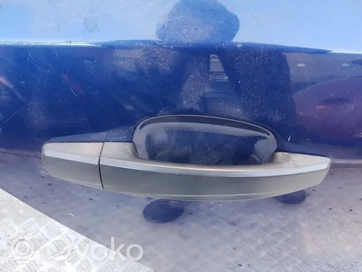 Opel Astra H Front door exterior handle 