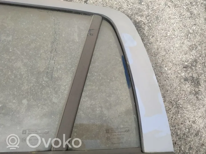 Opel Astra G Rear vent window glass 