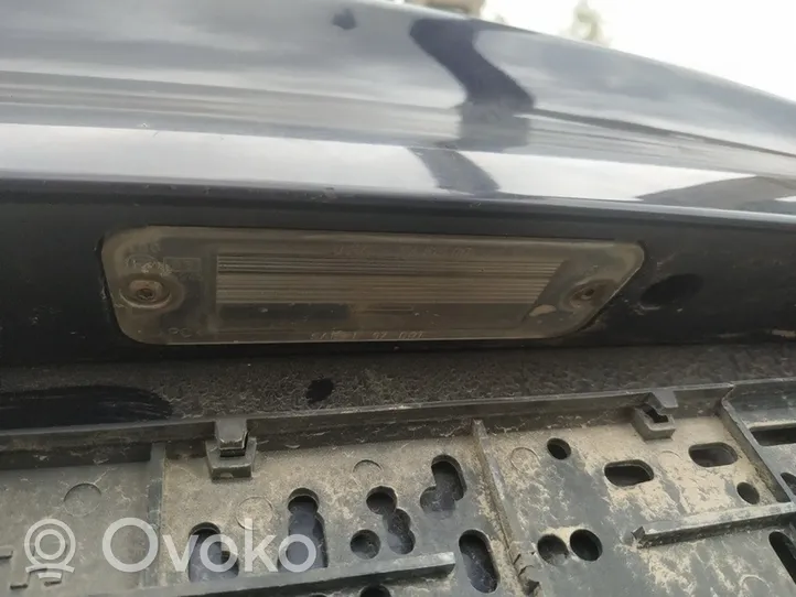 Saab 9-3 Ver1 Lampa oświetlenia tylnej tablicy rejestracyjnej 