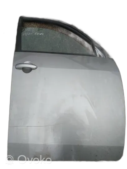 Nissan Primera Drzwi przednie pilkos