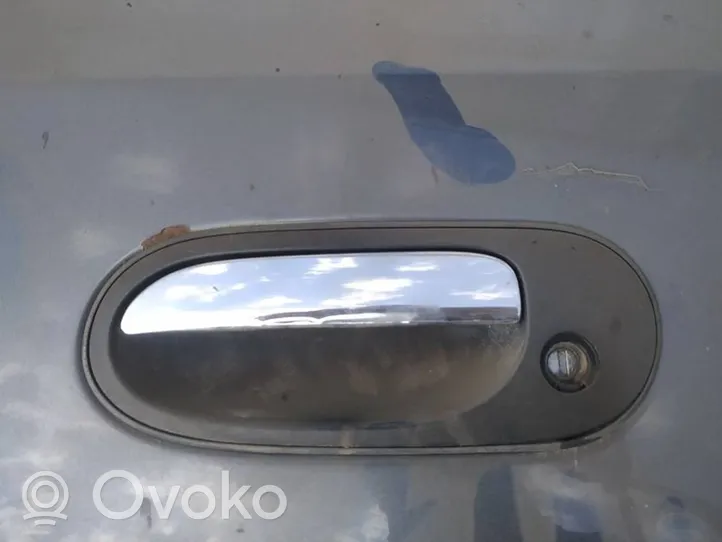 Nissan Almera Tino Front door exterior handle 