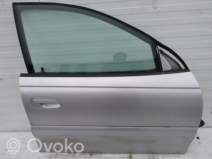 Opel Omega B2 Priekinės durys sidabrine