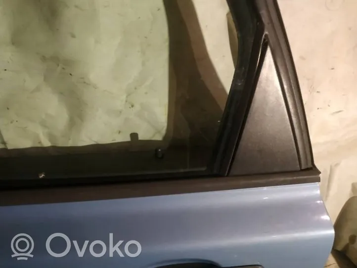 Volvo V50 Rear door glass trim molding 