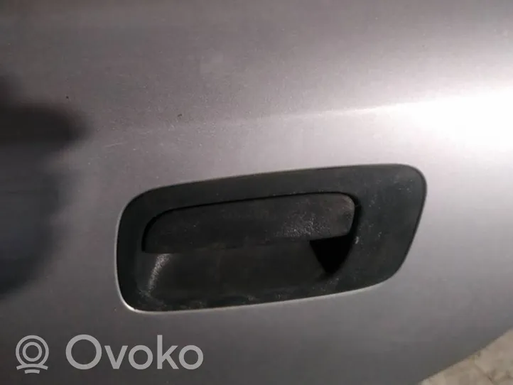 Opel Astra G Front door exterior handle 