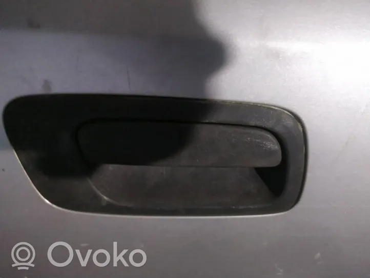 Opel Astra G Front door exterior handle 