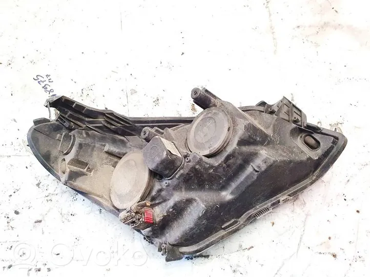 Opel Astra H Lampa przednia 24451032