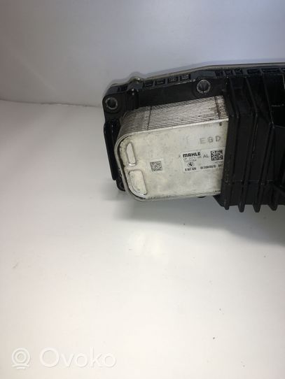 Toyota Avensis T270 Supporto di montaggio del filtro dell’olio 8507626