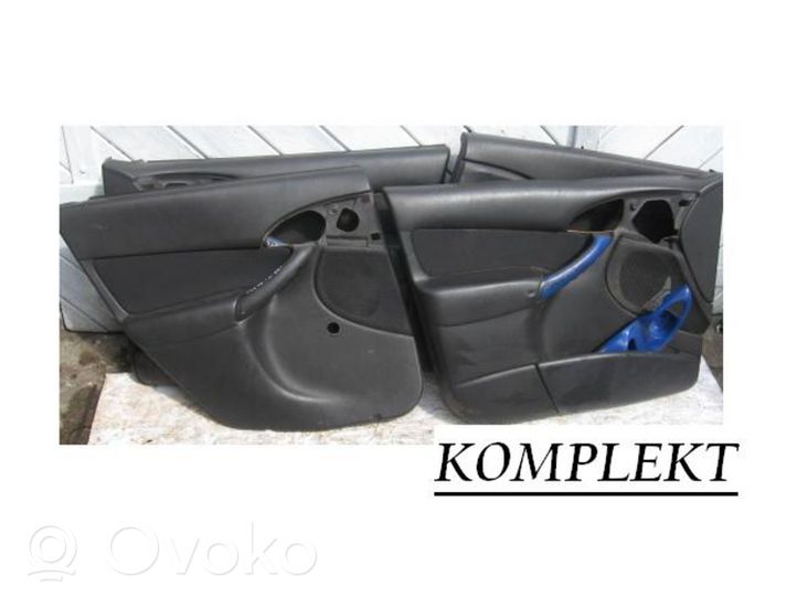 Ford Focus Apmušimas priekinių durų (obšifke) 98ABA23942