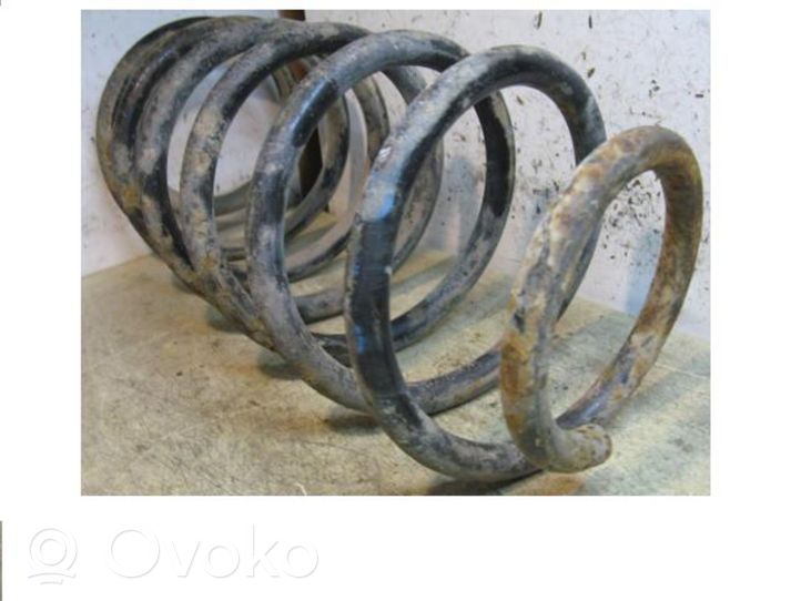 Volkswagen PASSAT B2 Front coil spring 