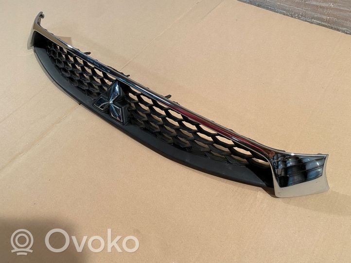 Mitsubishi Lancer VIII Maskownica / Grill / Atrapa górna chłodnicy 7450B021