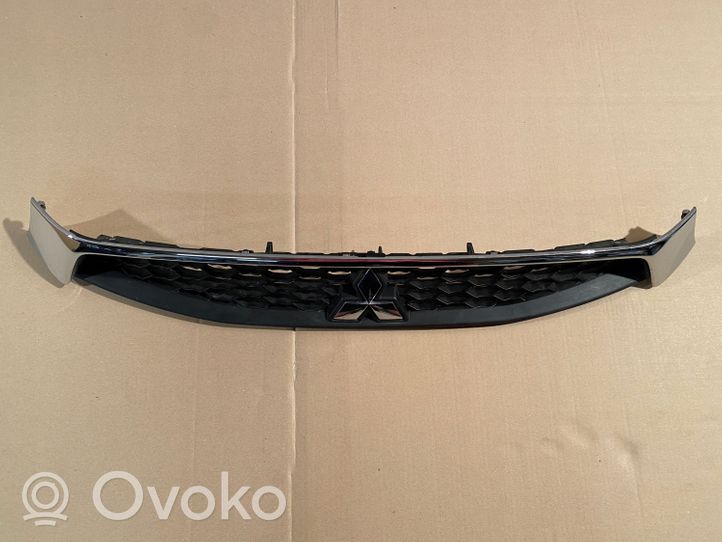 Mitsubishi Lancer VIII Maskownica / Grill / Atrapa górna chłodnicy 7450B021