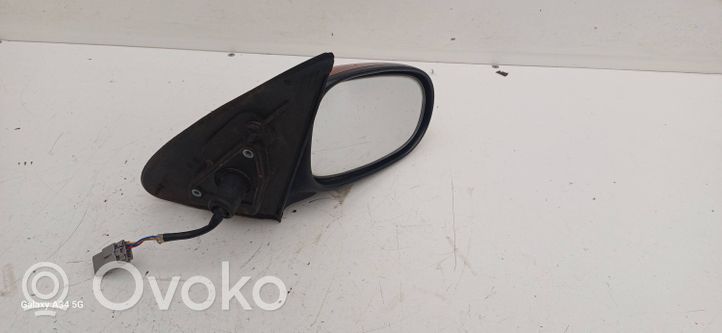 Nissan Almera Tino Etuoven sähköinen sivupeili E11015541