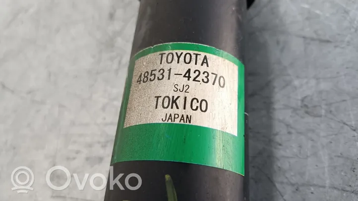 Toyota RAV 4 (XA40) Takaiskunvaimennin kierrejousella 4853142370