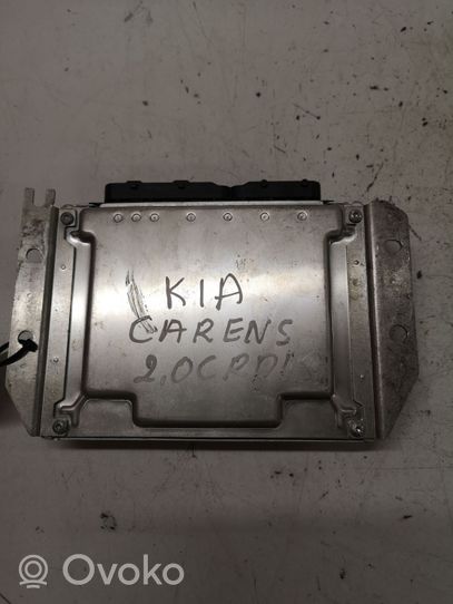 KIA Carens II Блок управления двигателя 0281011024