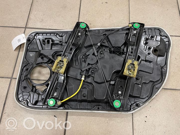 Volvo V40 Elektryczny podnośnik szyby drzwi przednich 933431